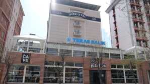 A building with multiple storefronts, including 'TERAS BALIK' and 'SÖROTEL'. - Sor Hotel Eskisehir (Eskisehir)