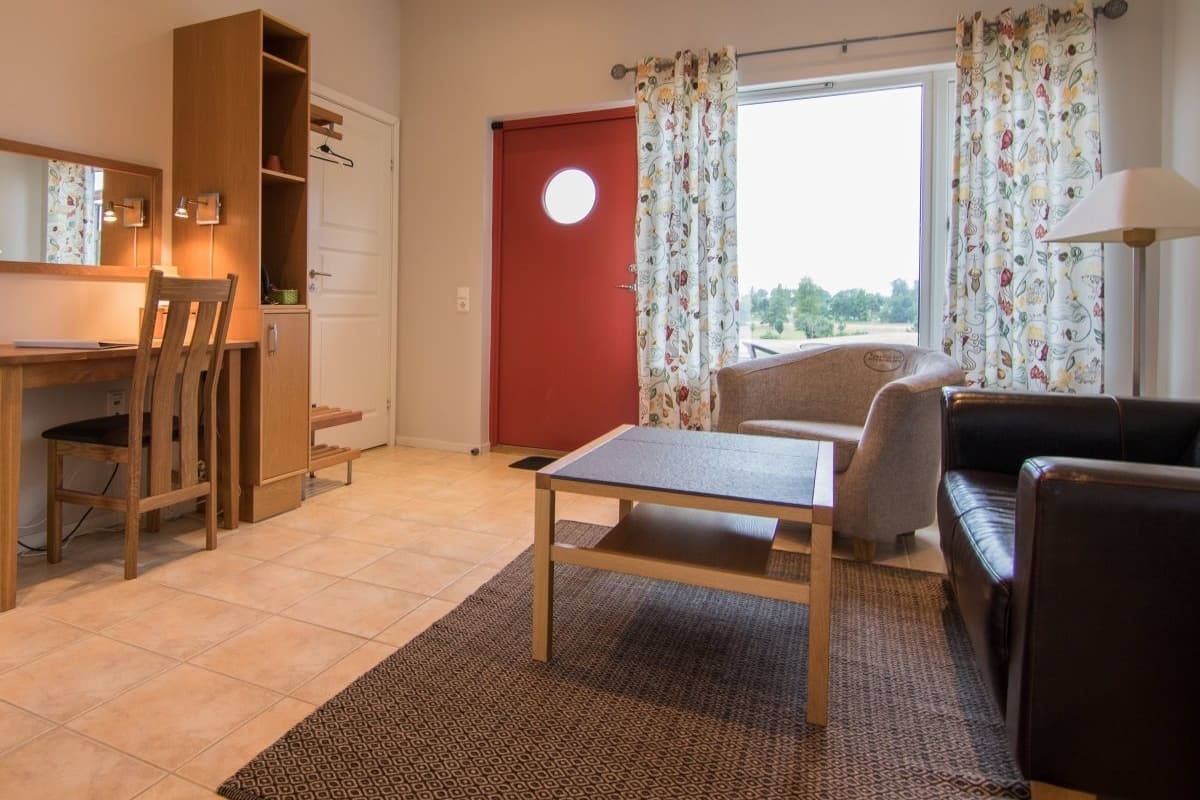 standard suite, 2 bedrooms | living room | 40-inch flat-screen tv with digital channels, tv