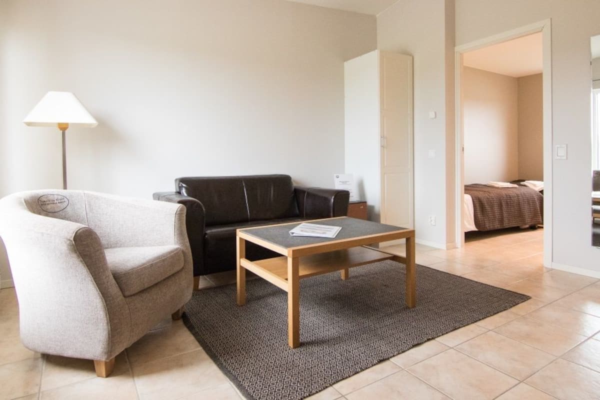 standard suite, 2 bedrooms | living room | 40-inch flat-screen tv with digital channels, tv