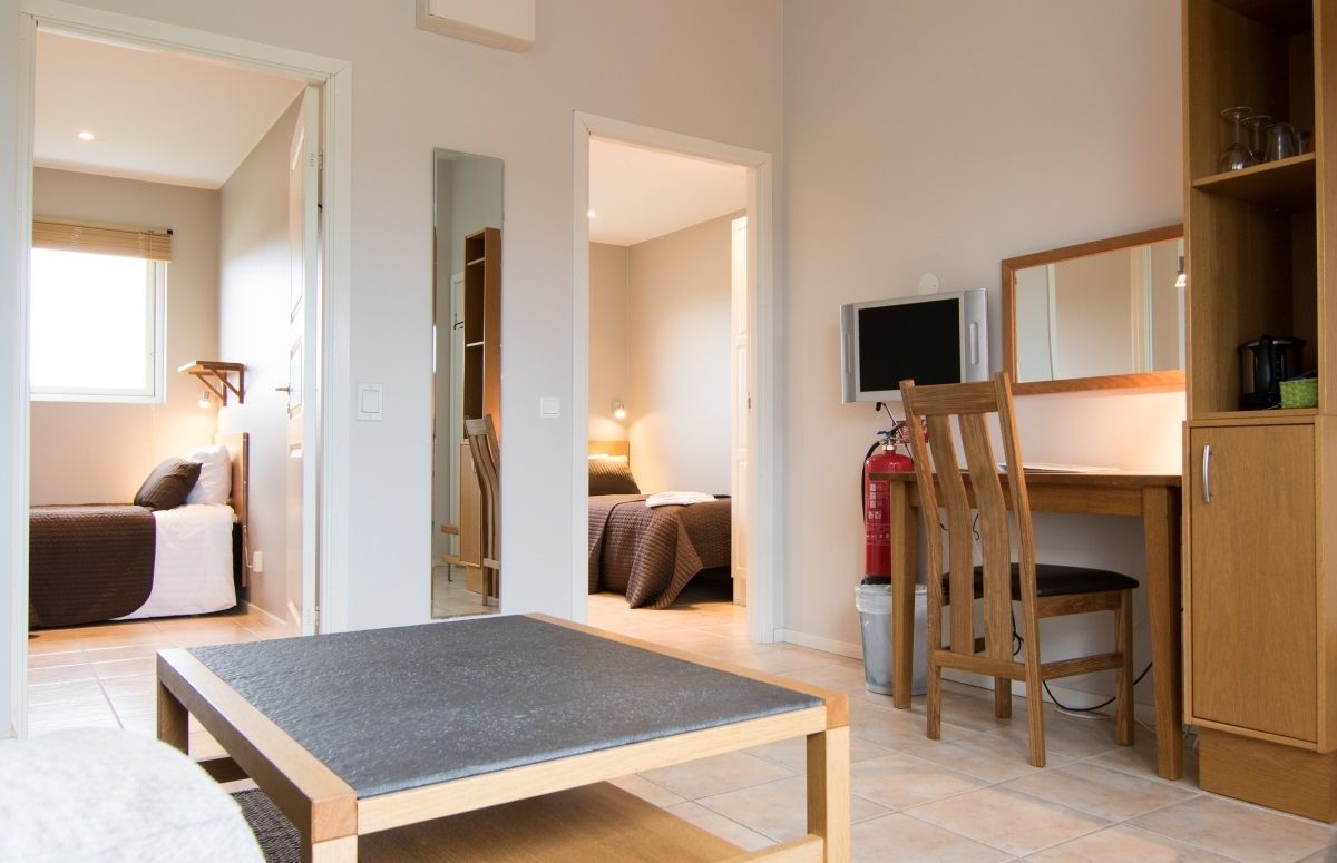 standard suite, 2 bedrooms | living room | 40-inch flat-screen tv with digital channels, tv