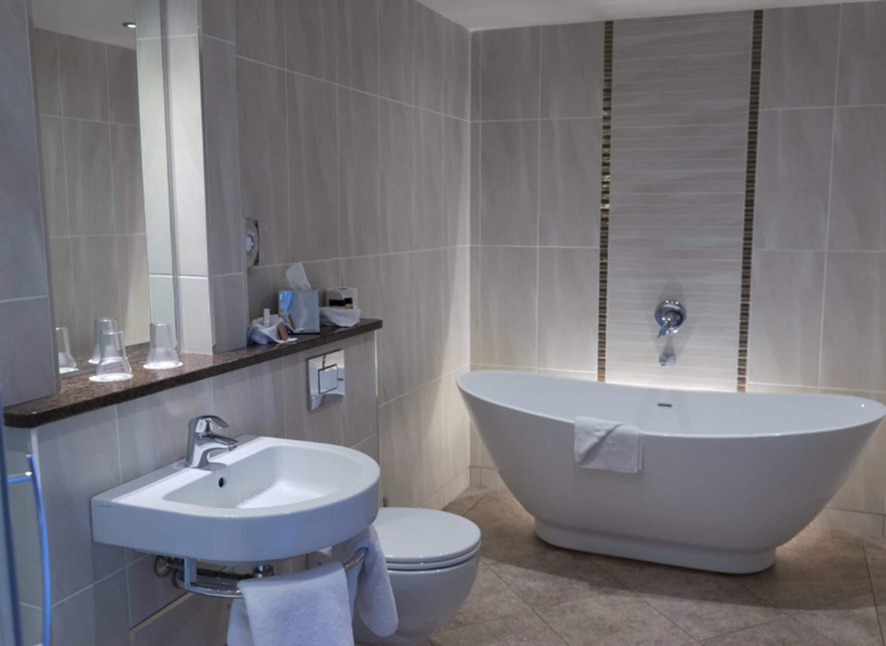 combined shower/bathtub, free toiletries, hair dryer, bathrobes