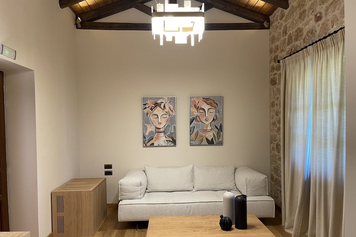 Junior Suite | Living area | Flat-screen TV