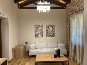 Suite – junior | Oppholdsområde | Flatskjerm-TV