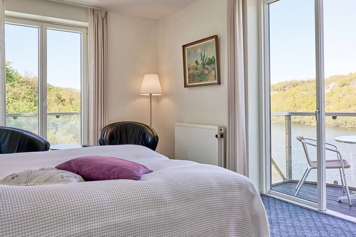 Dobbeltværelse med balkon og søudsigt (A) Premium i hovedbygningen | 羽絨被、免費無線上網、獨特裝潢、布置獨特