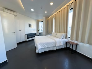 Hug Suite, 1 Bedroom, 1 Living Room  | In-room safe, desk, soundproofing, iron/ironing board - Hamra Urban Gardens (Beirut)