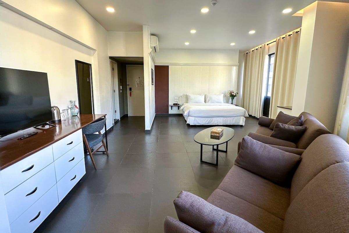 Junior Suite, 1 Bedroom | In-room safe, desk, soundproofing, iron/ironing board
