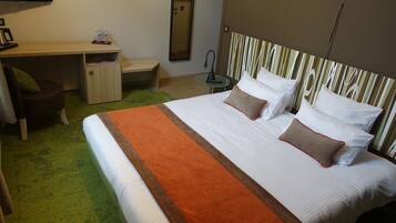 Superior kamer, 1 twee- of 2 eenpersoonsbedden | Een minibar, een bureau, gratis wifi, beddengoed