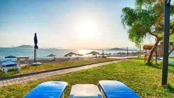 Private beach, beach shuttle, sun loungers, beach umbrellas