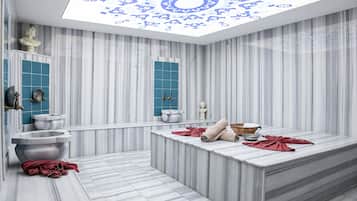 Bathroom features a large sink, two basins, and a unique ceiling design.