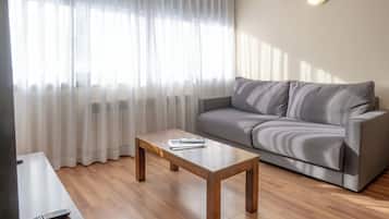 Apartment, 1 Bedroom | Living area | TV