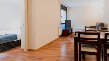 Apartment, 1 Bedroom | Living area | TV