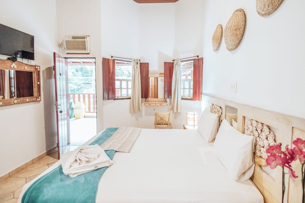 Kamar Deluks | Minibar, tempat tidur bayi, Wi-Fi gratis, dan seprai linen