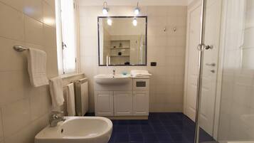 Apartment, 2 Bedrooms (Location: via Romana di Quarto) | Bathroom | Shower, free toiletries, hair dryer, bidet