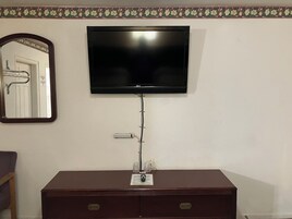 Standard Room, 1 King Bed | Living area | TV