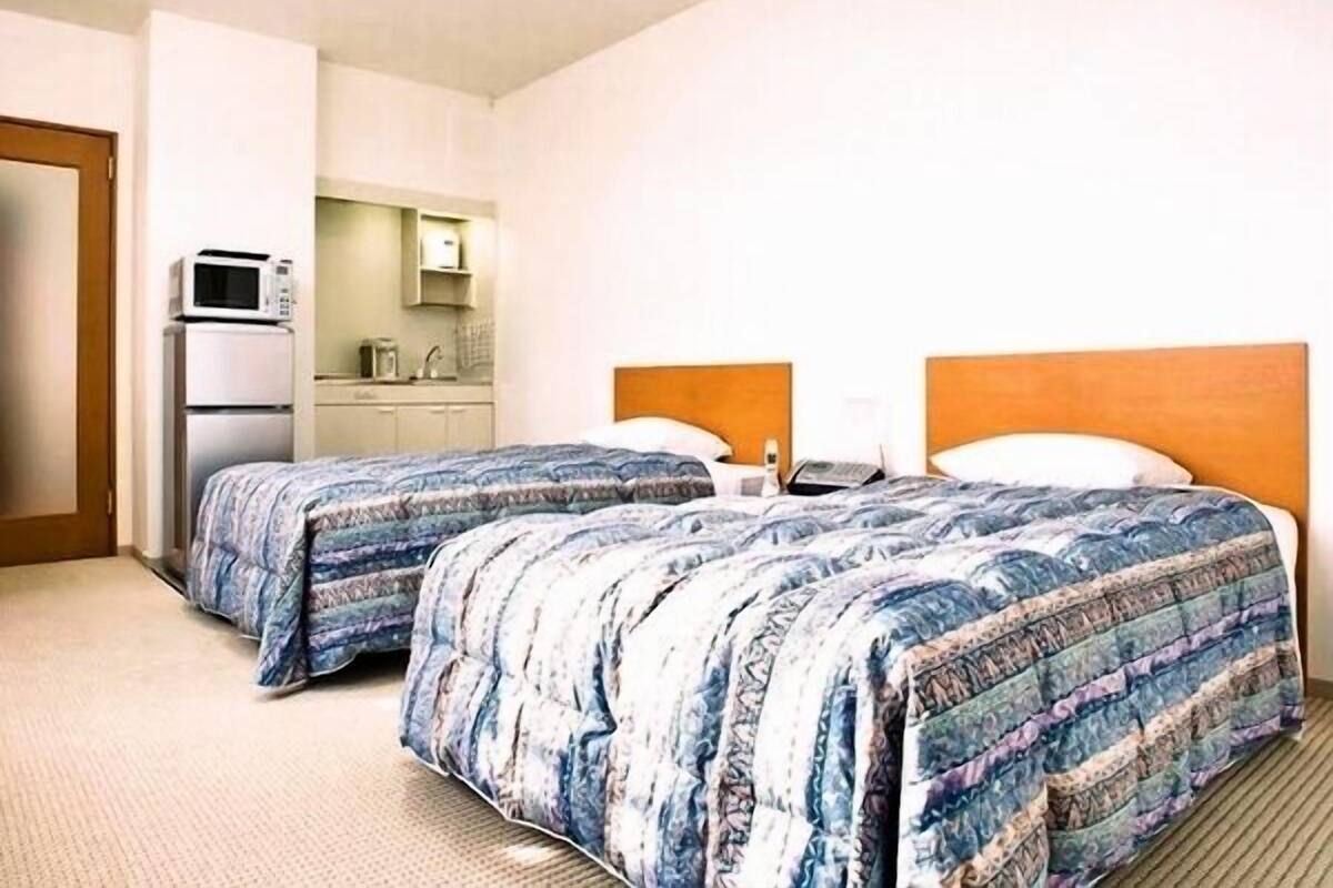 Habitación con 2 camas individuales (Annex) | Escritorio, camas extra, wifi gratis y ropa de cama