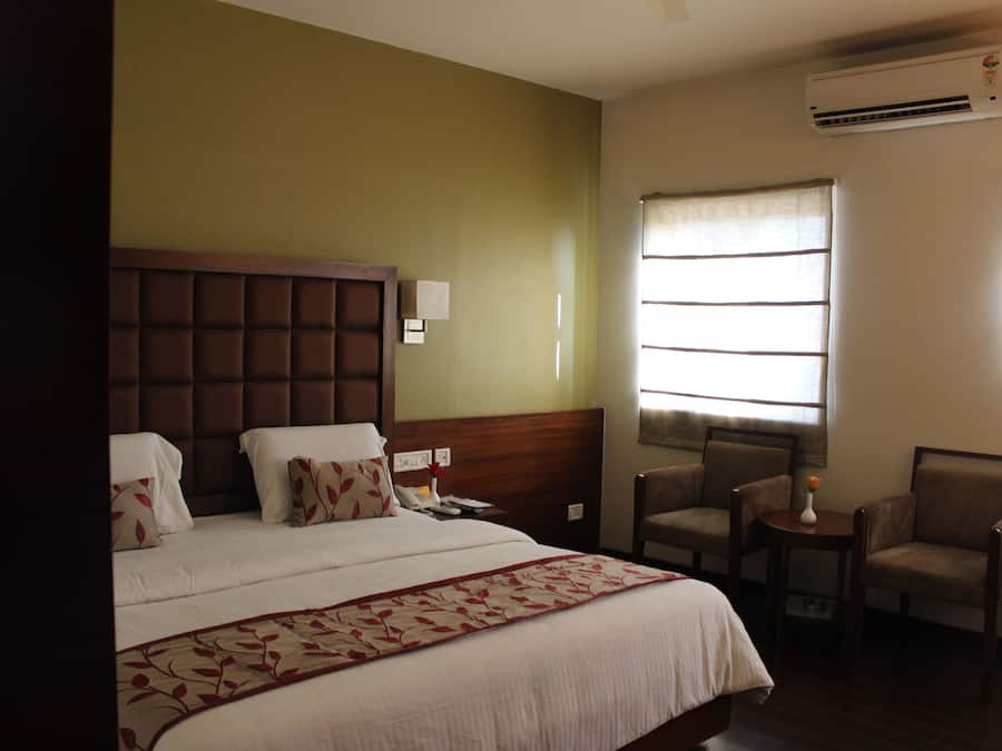 Desk, laptop workspace, blackout drapes, soundproofing