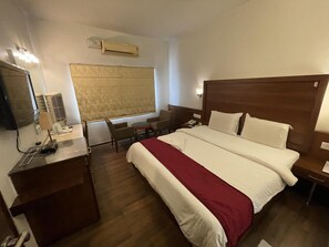 Desk, laptop workspace, blackout curtains, soundproofing - Stay Inn (Hyderabad)