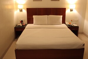 Desk, laptop workspace, blackout curtains, soundproofing - Stay Inn (Hyderabad)