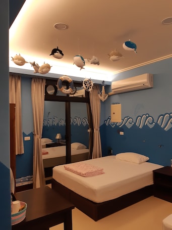 Standard Quadruple Room | Blackout drapes, free WiFi, bed sheets