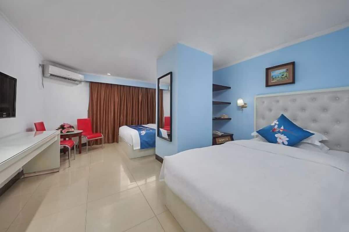 Desk, blackout drapes, iron/ironing board