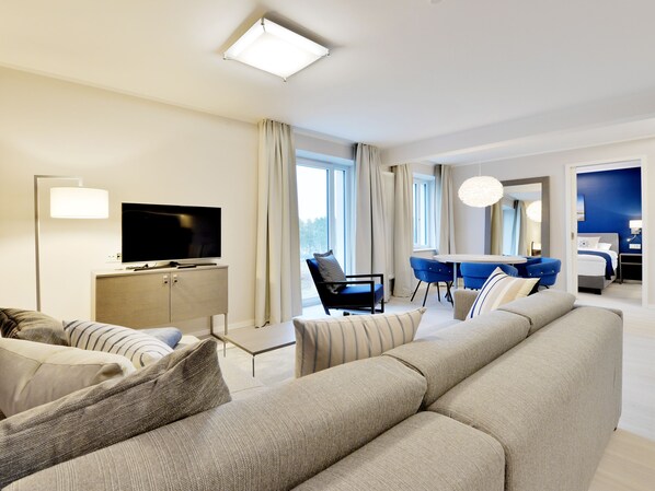 Family Suite, 2 Bedrooms | Living area | Flat-screen TV
