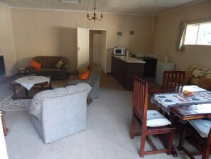 House | Living room | 32-inch flat-screen TV with cable channels, TV - Greendale Dawnhill Cottage (Harare)