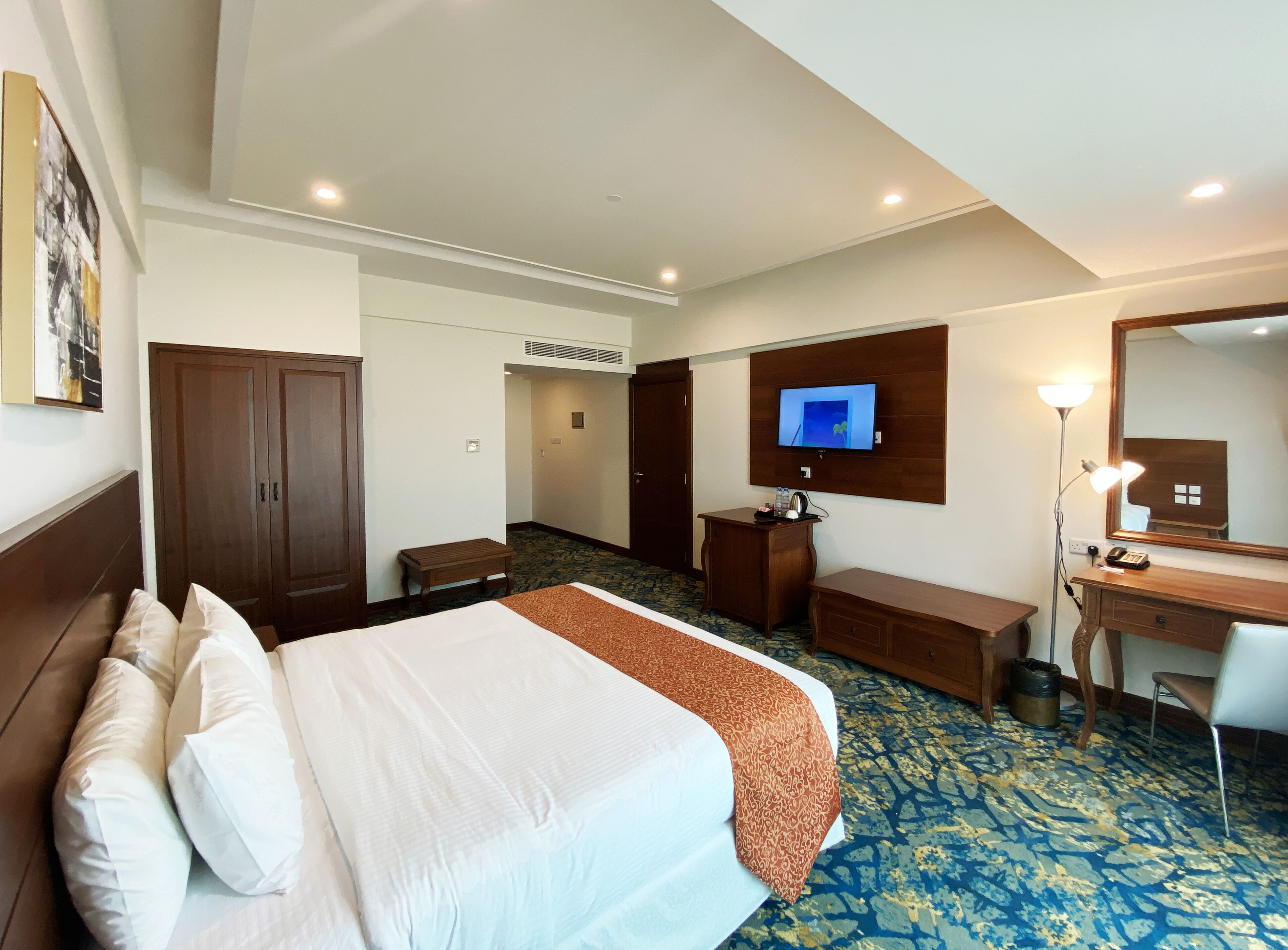 deluxe room | premium bedding, in-room safe, desk, soundproofing