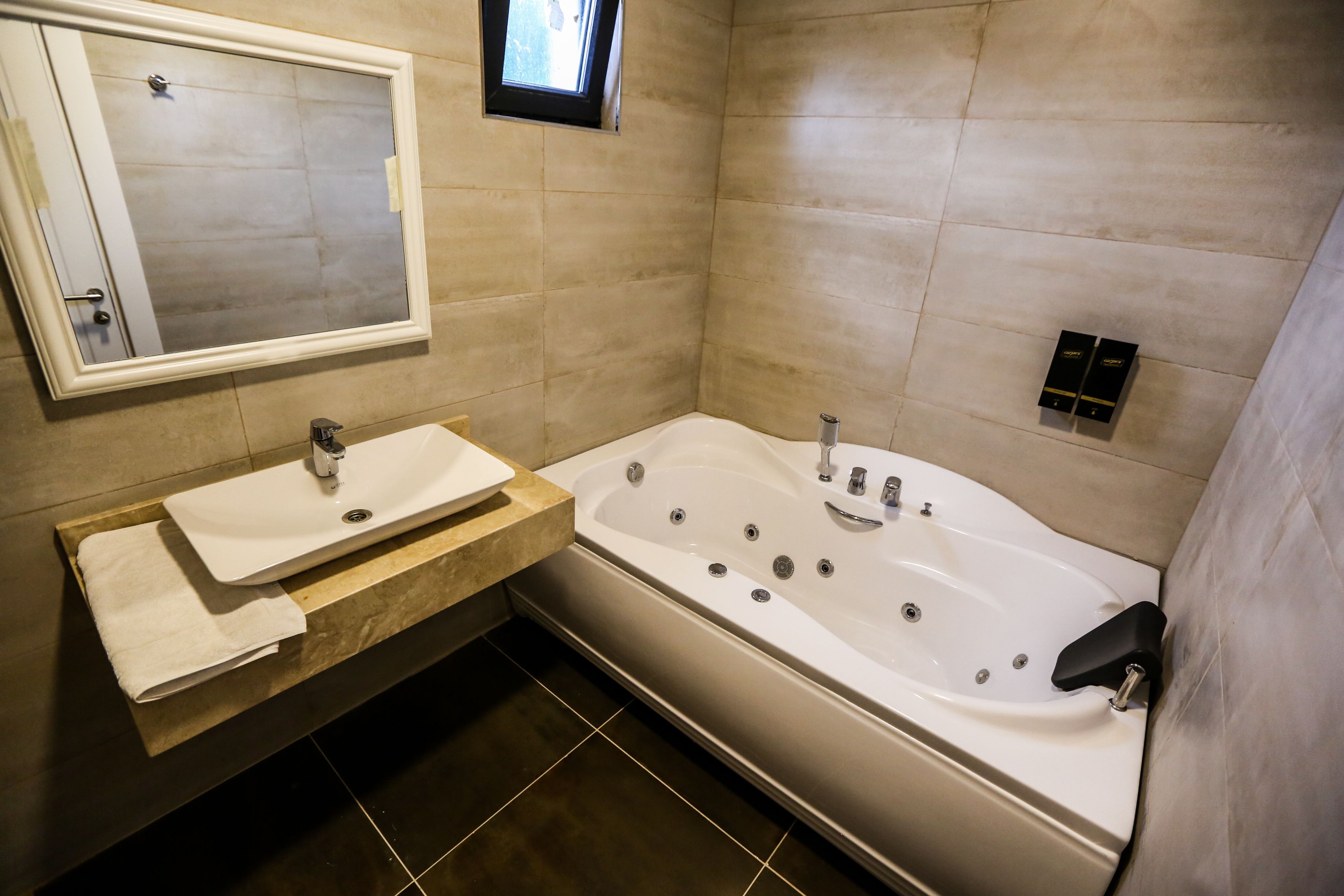 suite, jetted tub | in-room safe, desk, iron/ironing board, free wifi