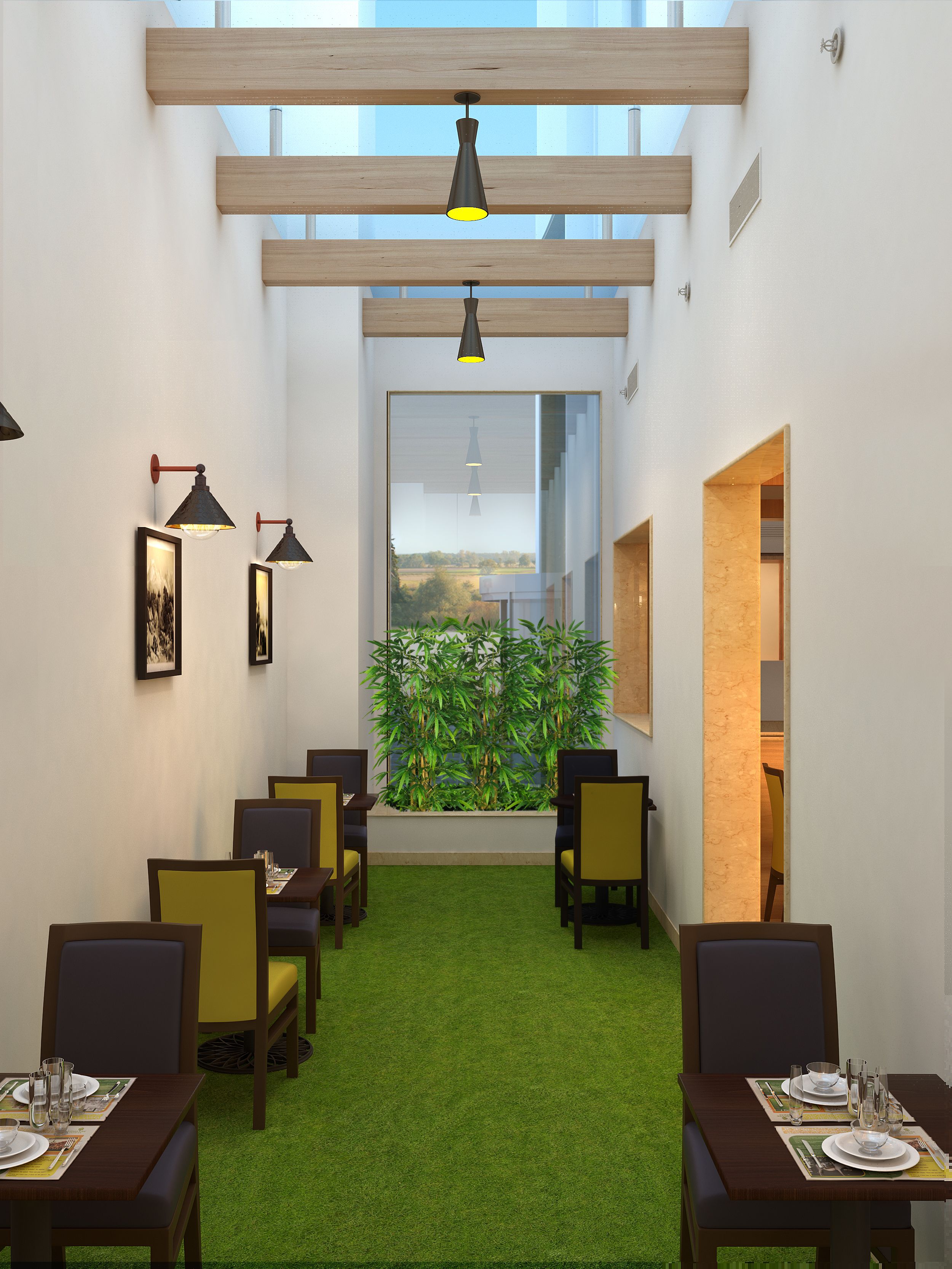 A dining area with a green artificial grass floor, wooden tables, and chairs, framed by a large window with a view of greenery.