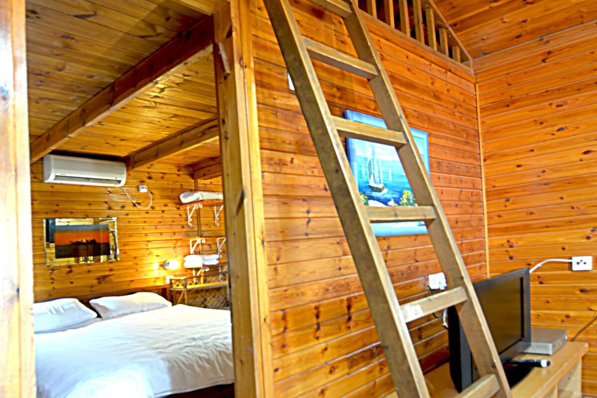 Cabin, 1 Bedroom | Living area | Flat-screen TV