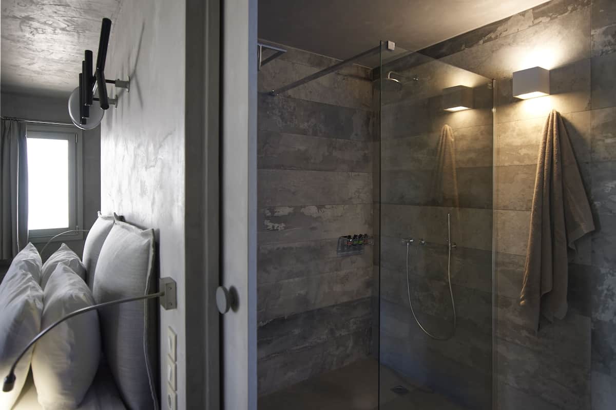 one bedroom studio sea view no 9 | bathroom | shower, designer toiletries, hair dryer, slippers