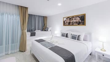 Deluxe Triple Room | In-room safe, blackout drapes, free WiFi, bed sheets