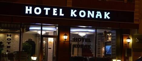 The exterior of Hotel Konak with a prominent sign.