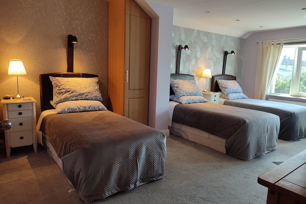 Family Quadruple Room | Individually decorated, individually furnished, desk, blackout drapes