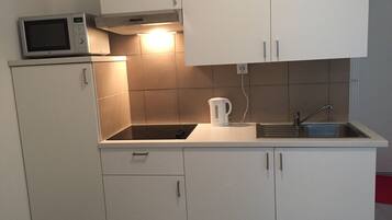 Standard Studio, 1 King Bed with Sofa bed | Living area | Flat-screen TV