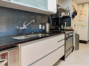 Fridge, microwave, cookware/dishes/utensils