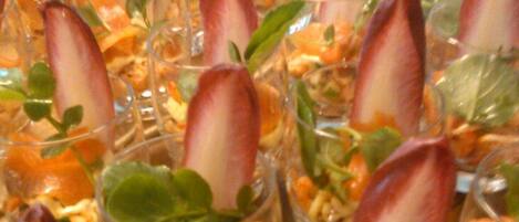 A tray of appetizers with various garnishes and ingredients.