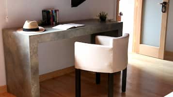 Deluxe Suite, 1 King Bed | Down comforters, individually decorated, desk, laptop workspace
