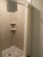 King Riverfront | Bathroom | Combined shower/tub, free toiletries, towels