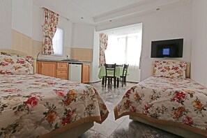 Chambre Quadruple Standard | Literie de qualité supérieure, Wi-Fi gratuit