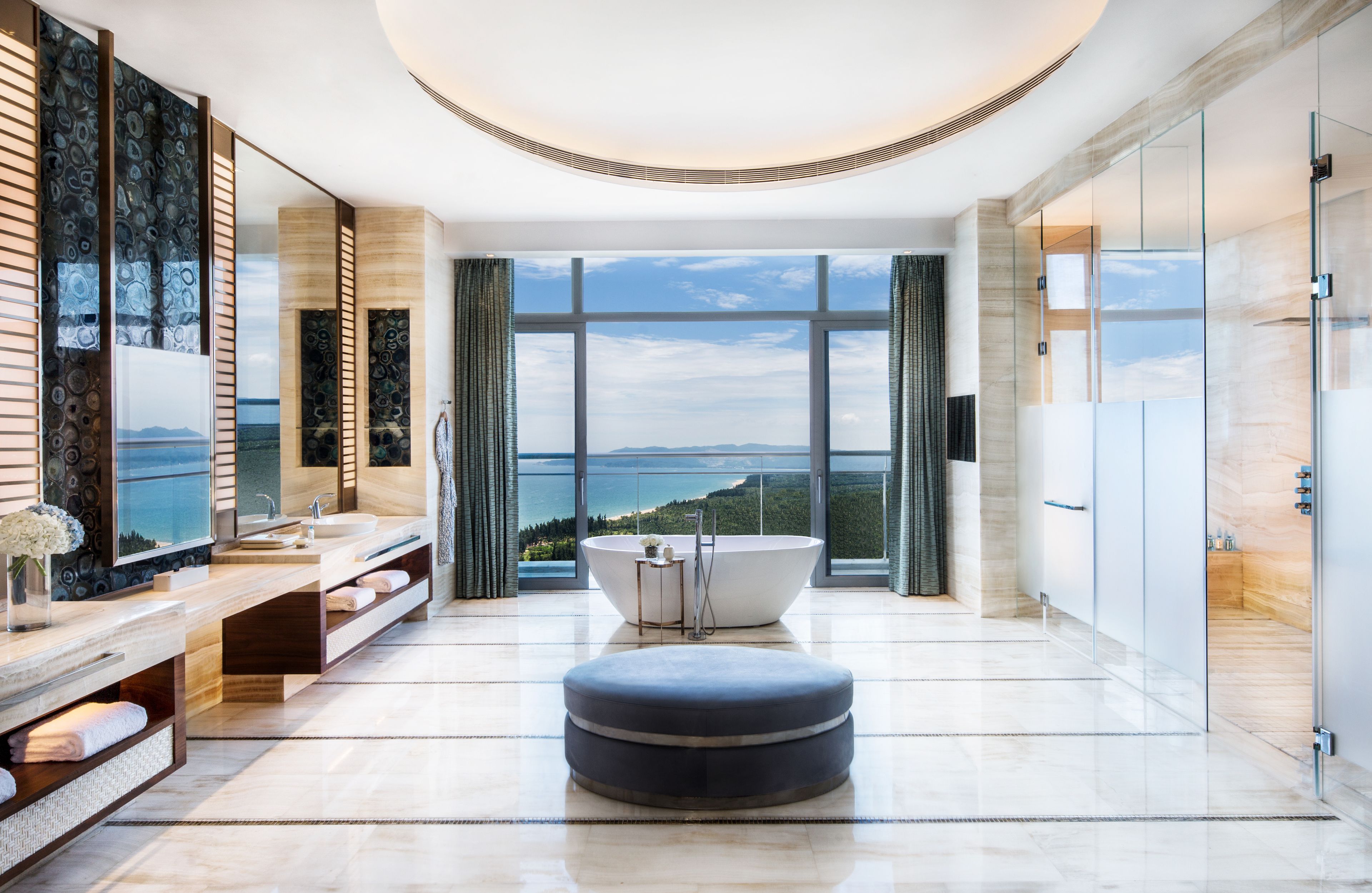 separate bathtub and shower, hair dryer, bathrobes, slippers