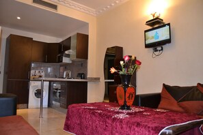 Classic Apartment, 1 Bedroom (Cosmos) | Living area | 32-inch LCD TV with satellite channels, TV - Sabor Apartment Anas Majorelle (Marrakech)