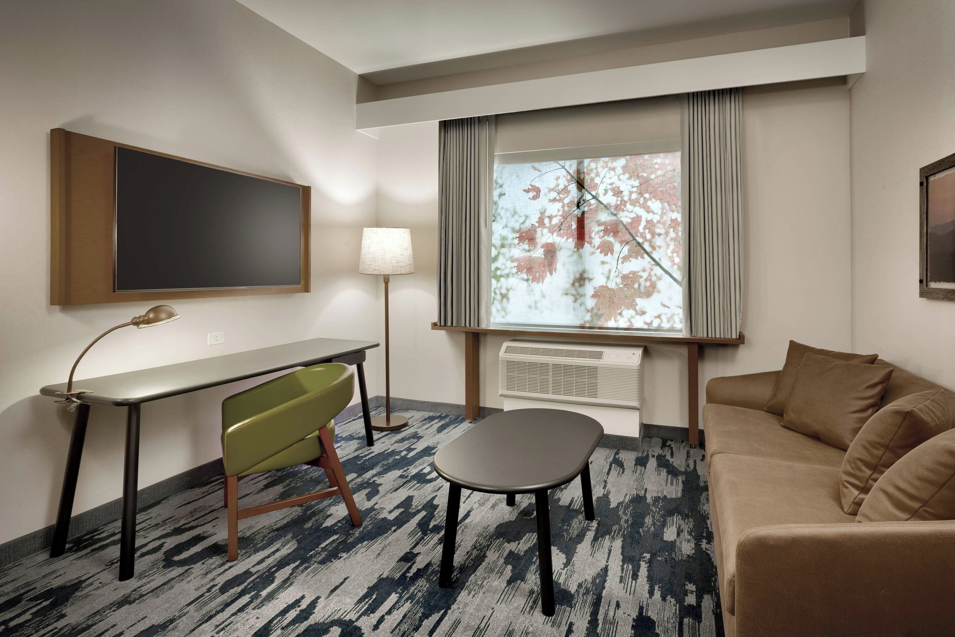 suite, 1 king bed with sofa bed | living room | 55-inch led tv with satellite channels, tv, netflix