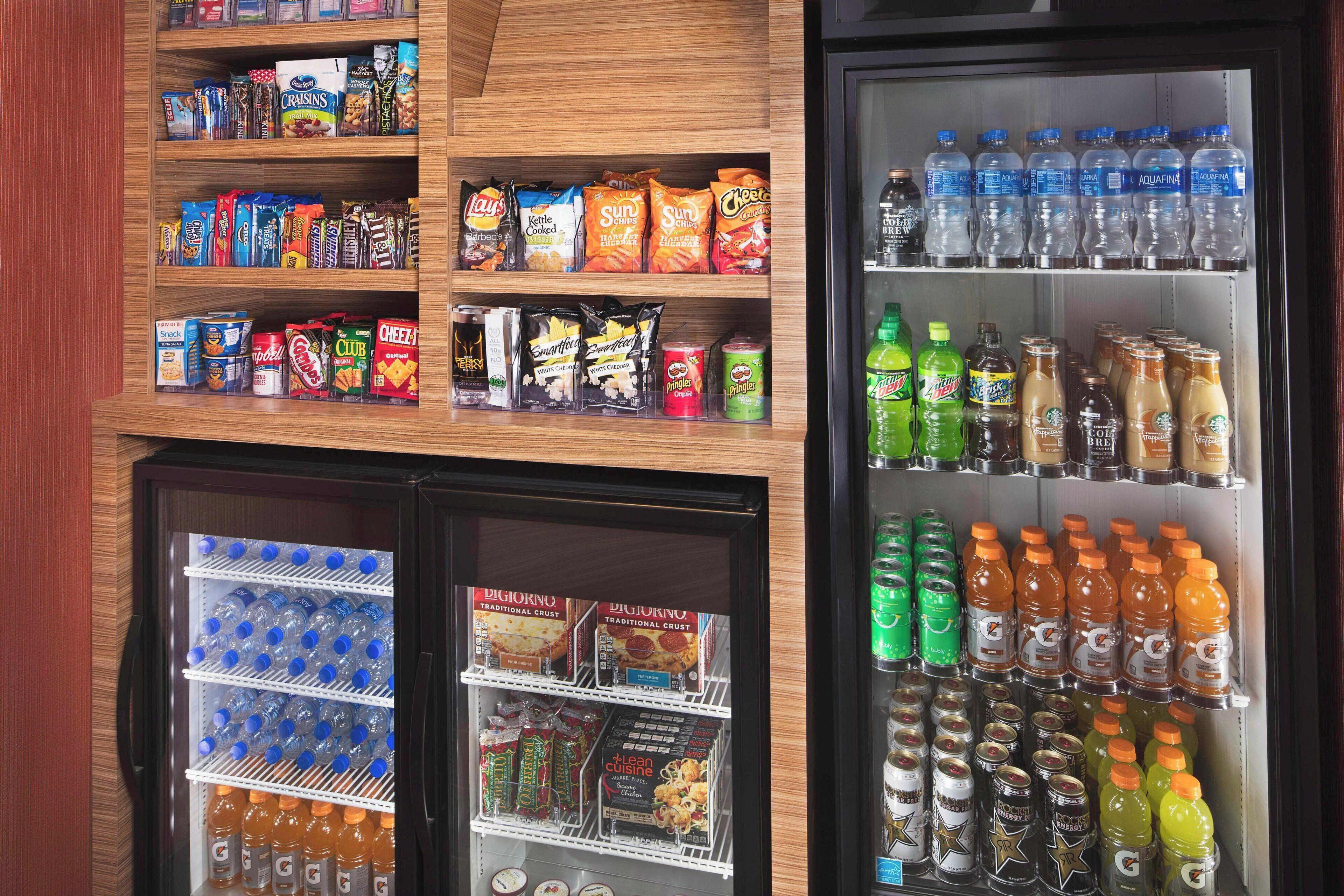 A vending machine stocked with snacks and beverages.