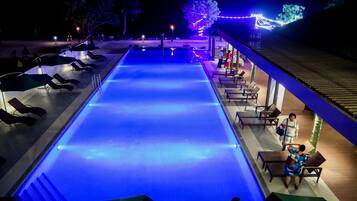 Outdoor pool, open 7 AM to 9 PM, pool umbrellas