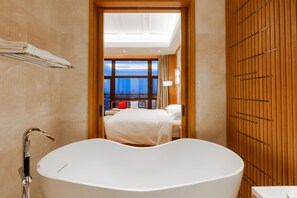 Separate tub and shower, eco-friendly toiletries, hair dryer, bathrobes