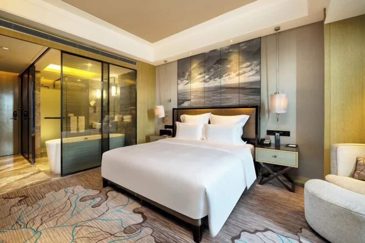 Ropa de cama de alta calidad, edredón, camas con pillow-top y minibar