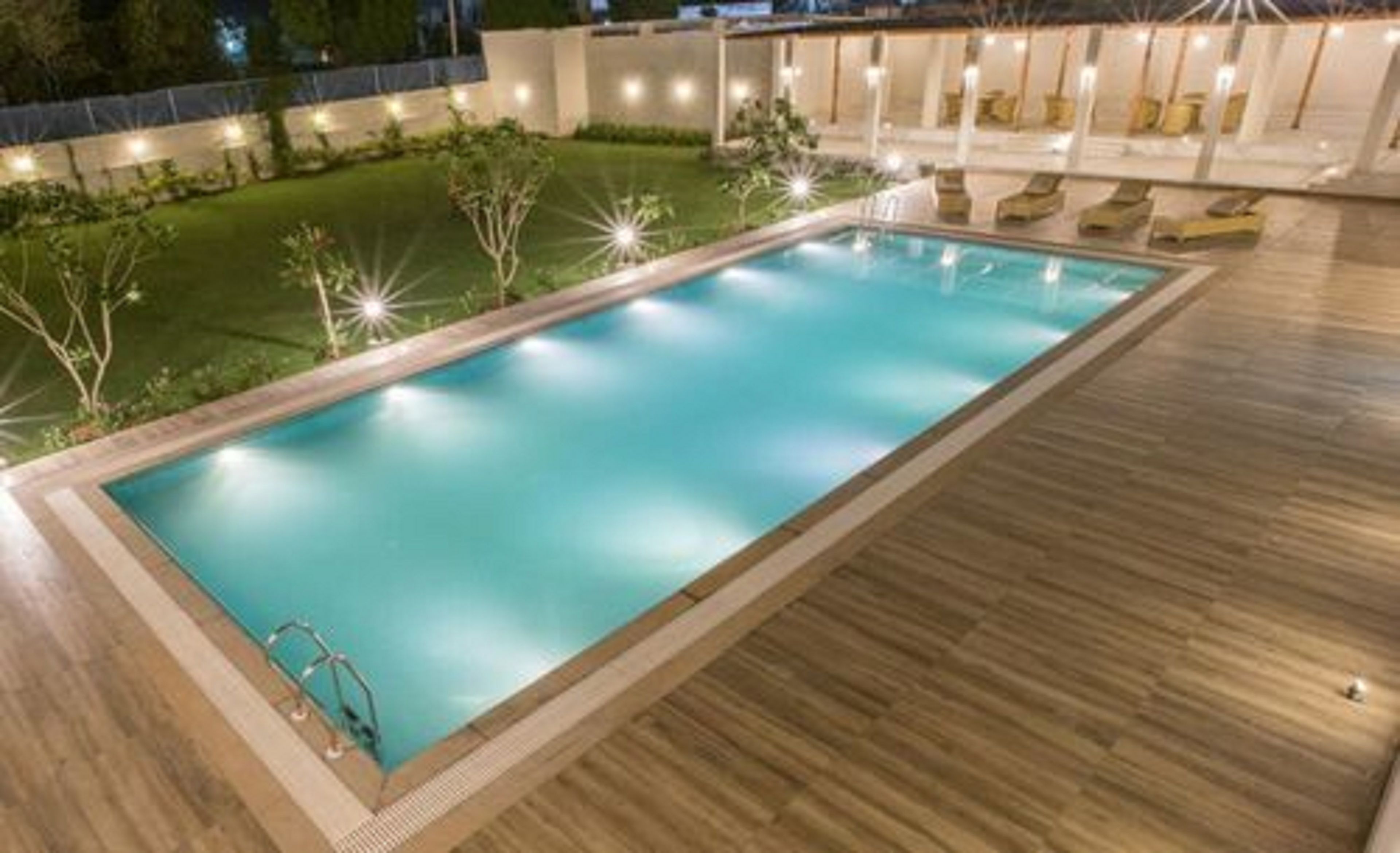 Outdoor pool, open 8:00 AM to 8:00 PM, sun loungers