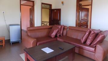 Apartment, 2 Bedrooms, Kitchenette | Living room | Flat-screen TV