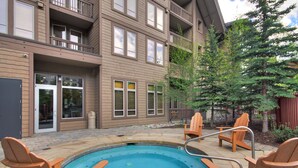A residential building with a swimming pool and outdoor seating. - Taylors Crossing In The Heart Of Copper Center Village - Short Walk to American Eagle/American Flyer - TX312 by RedAwning (Copper Mountain)